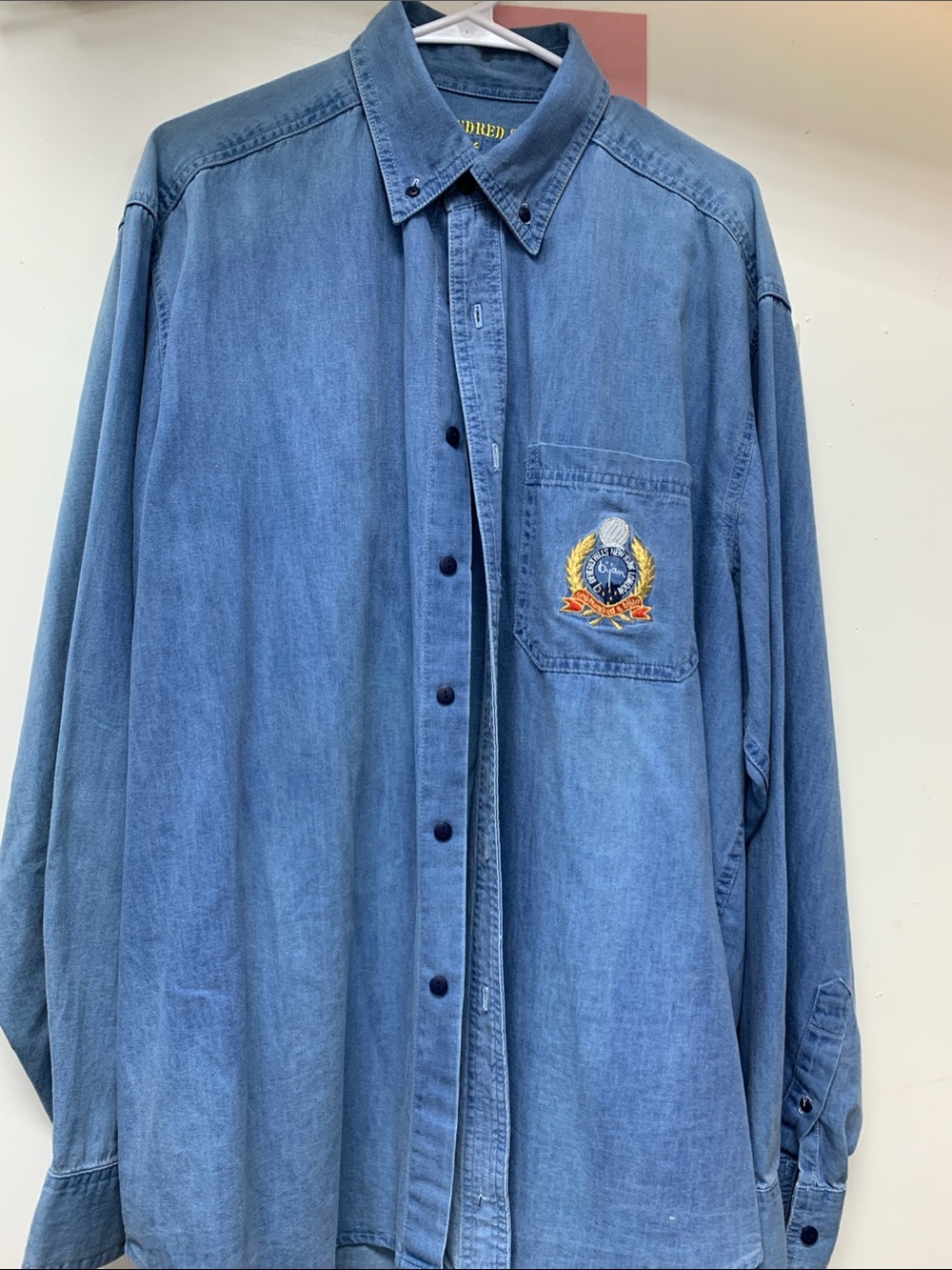 Men's Blue Denim Button-Down Shirt with Embroidered Crest